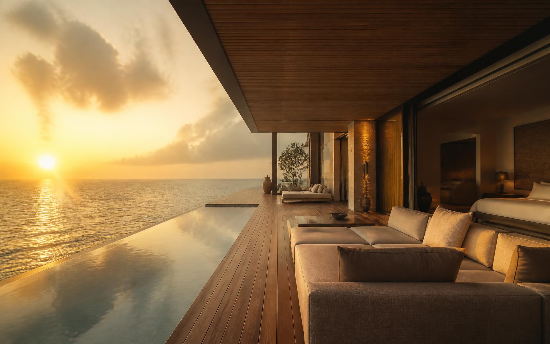 Luxury overwater resort suite at golden hour